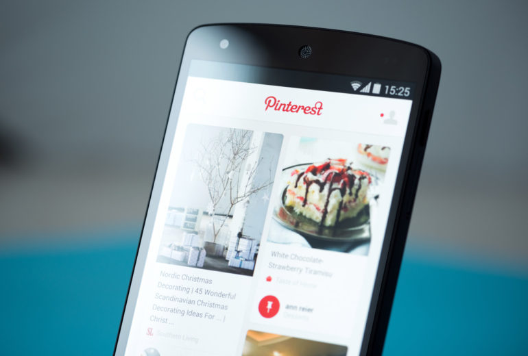 Kiev, Ukraine - September 22, 2014: Close-up shot of Google Nexus 5 smartphone with the Pinterest website on a screen.